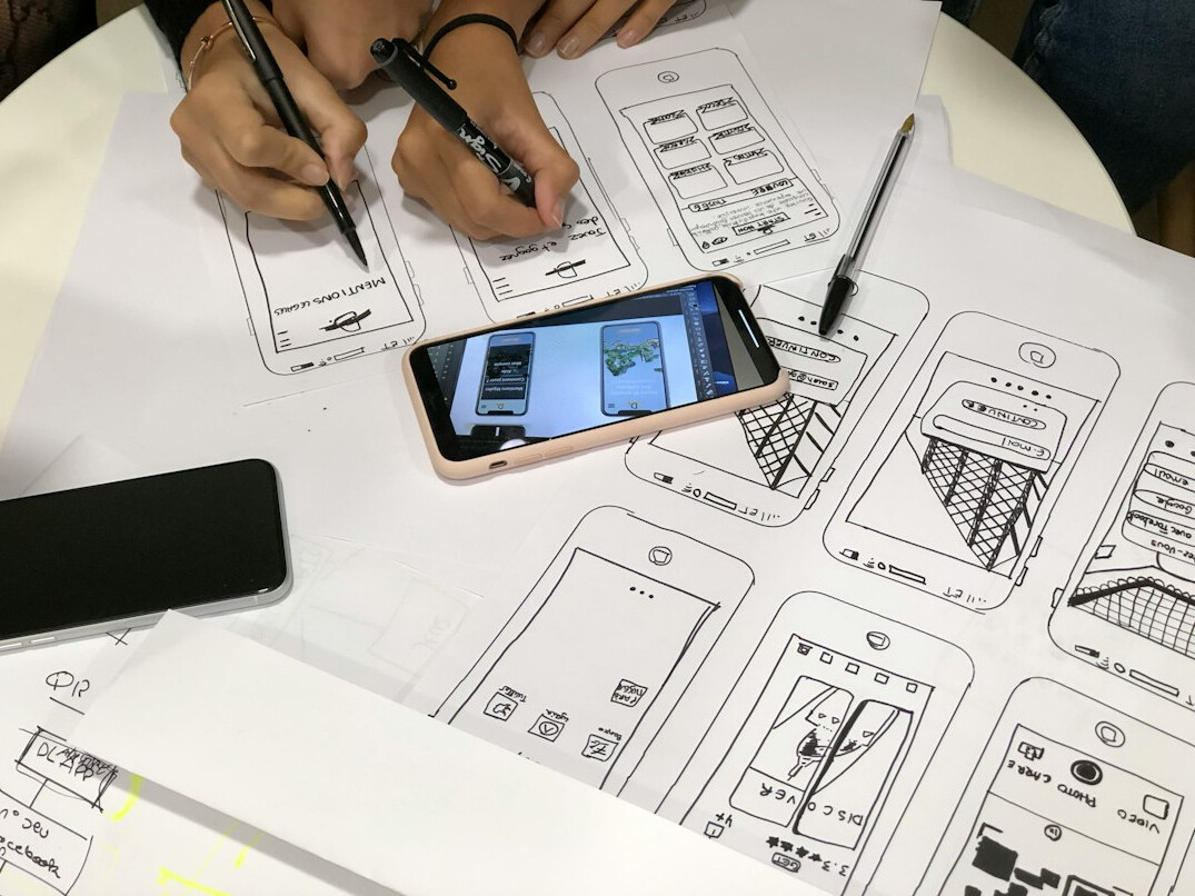 designer sketching ui wireframe